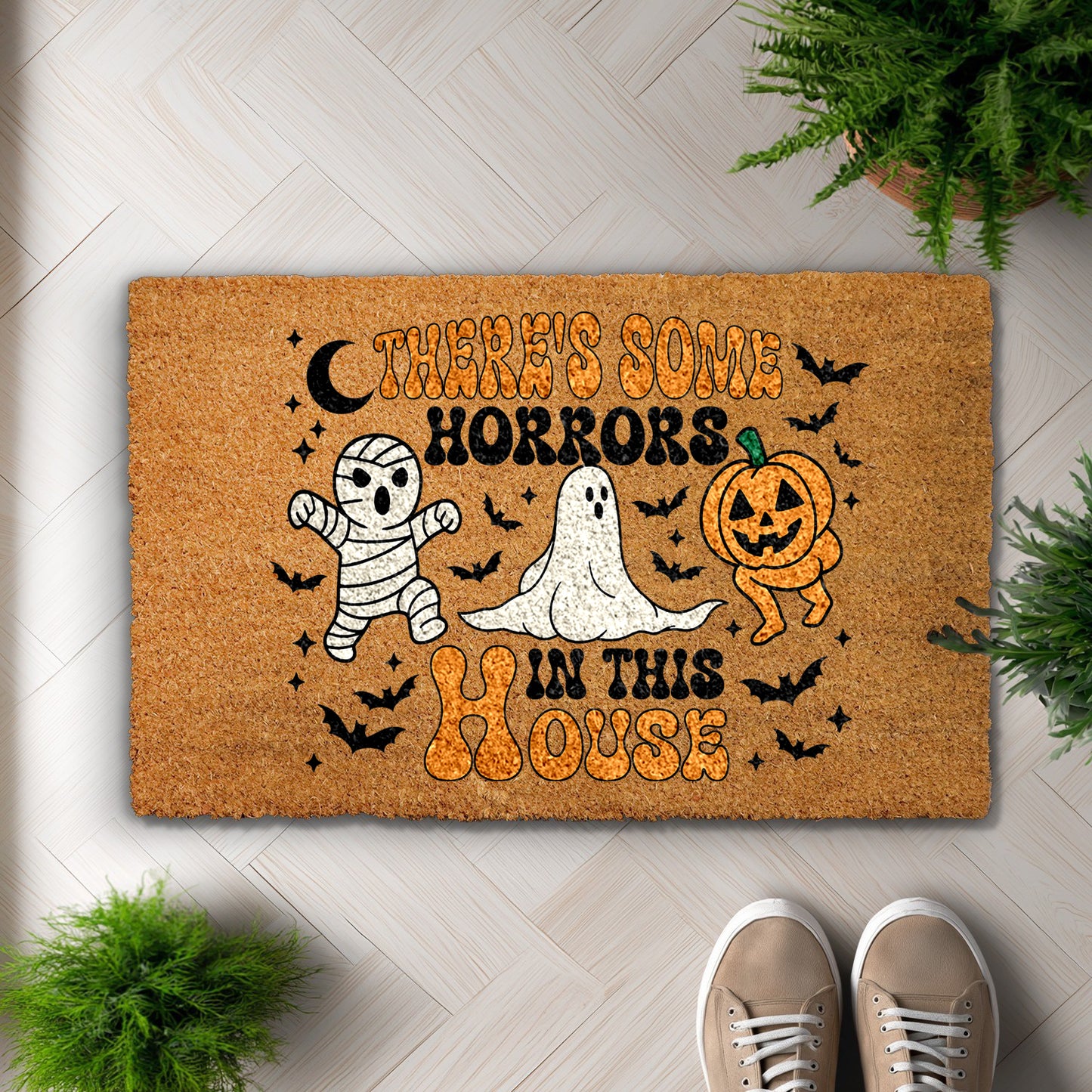 Spooky Halloween doormat featuring mummy, ghost, pumpkin design for fall.
