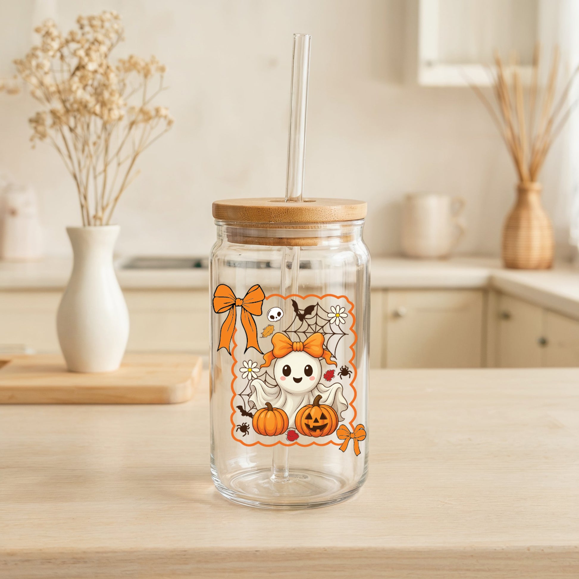 Girly ghost and pumpkin design glass cup for Halloween parties.