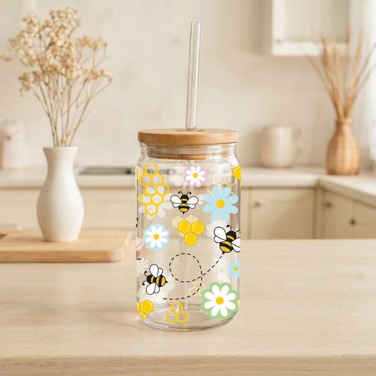 Bee-themed glass tumblers for stylish sips.