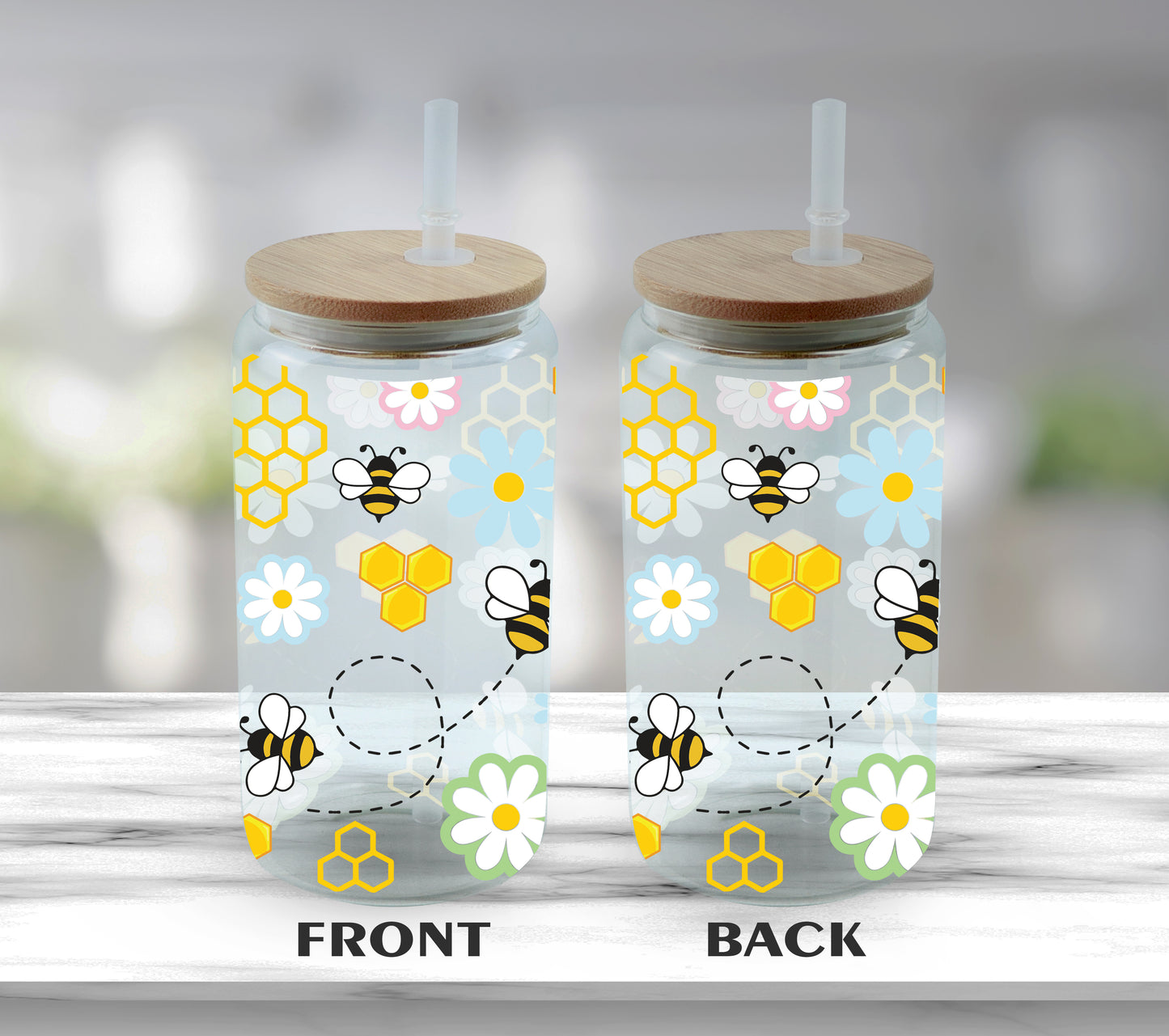 Bee-themed glass tumblers for stylish sips.
