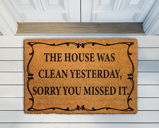 Sarcastic doormat, welcome with humor - sorry, house was clean.