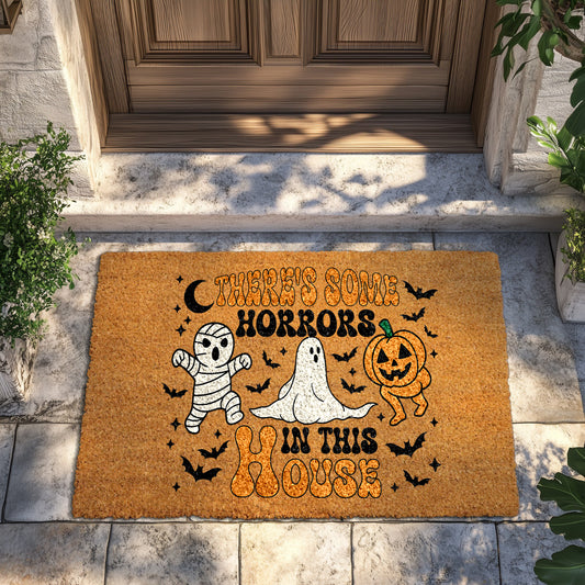 Spooky Halloween doormat featuring mummy, ghost, pumpkin design for fall.